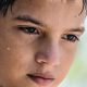 young boy sweating