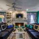 Living room with fireplace burning